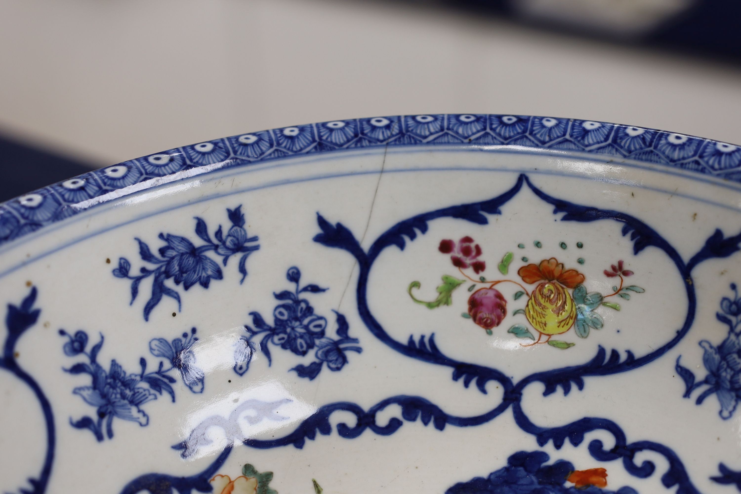 A Chinese underglaze blue and famille rose decorated basin or bowl, Qianlong period, 27 cm diameter